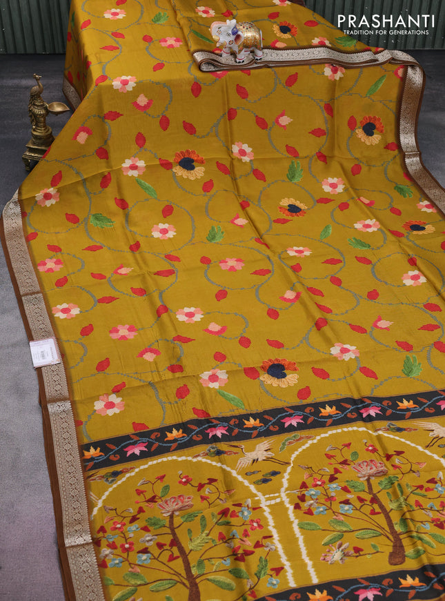 Tussar georgette silk saree mustard yellow and brown with allover digital prints and zari woven border