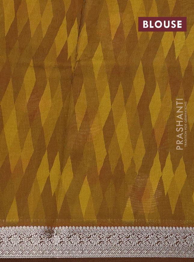 Tussar georgette silk saree mustard yellow and brown with allover digital prints and zari woven border