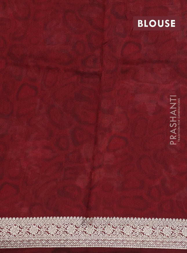 Tussar georgette silk saree maroon with allover digital prints and zari woven border