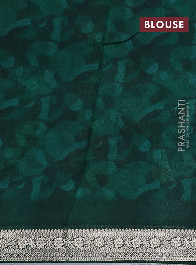 Tussar georgette silk saree green shade with allover digital prints and zari woven border