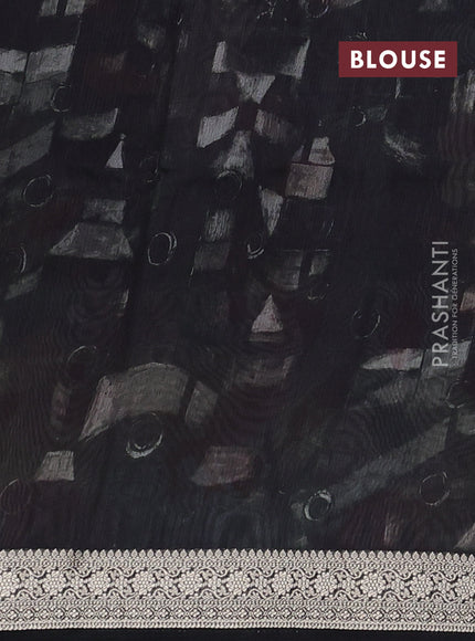 Tussar georgette silk saree black and sandal with allover digital prints and zari woven border