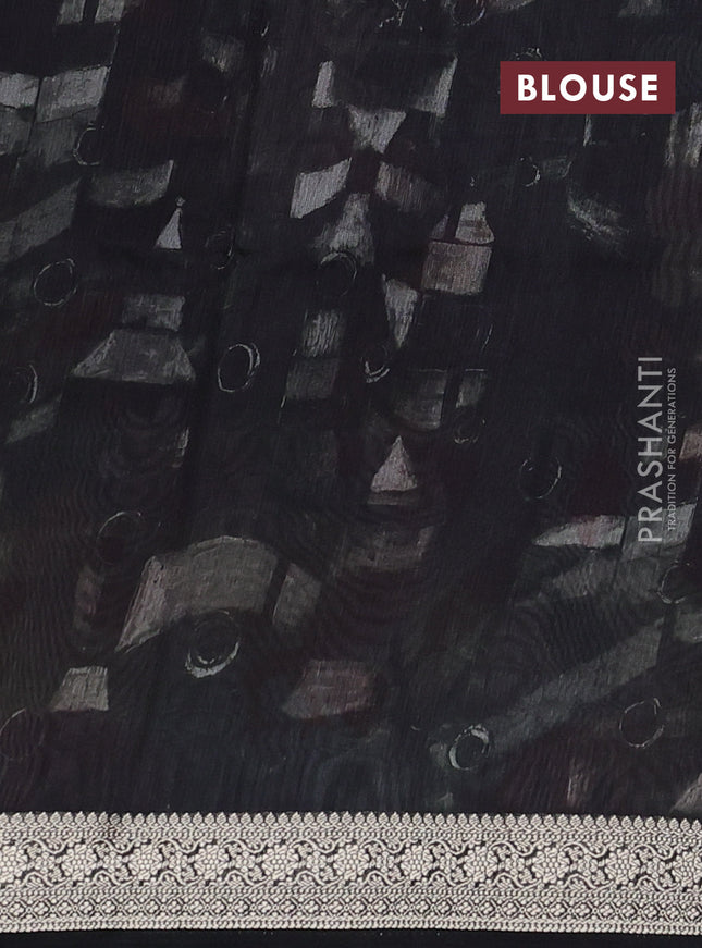Tussar georgette silk saree black and sandal with allover digital prints and zari woven border