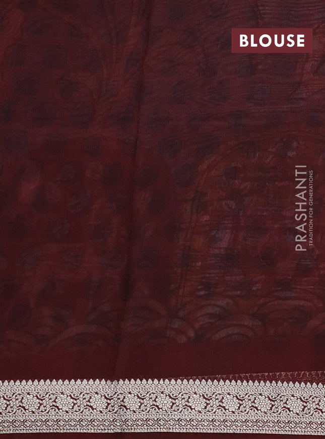Tussar georgette silk saree teal blue and maroon with allover digital prints and zari woven border