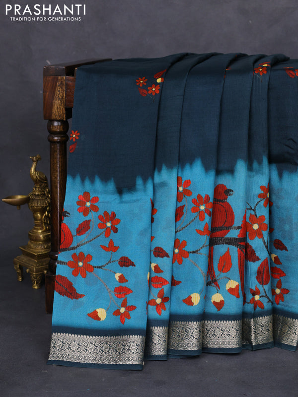 Tussar georgette silk saree peacock blue and pastel blue with allover digital prints and zari woven border