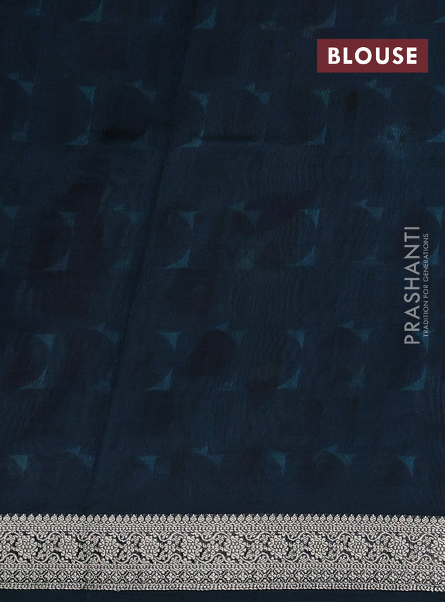 Tussar georgette silk saree peacock blue and pastel blue with allover digital prints and zari woven border