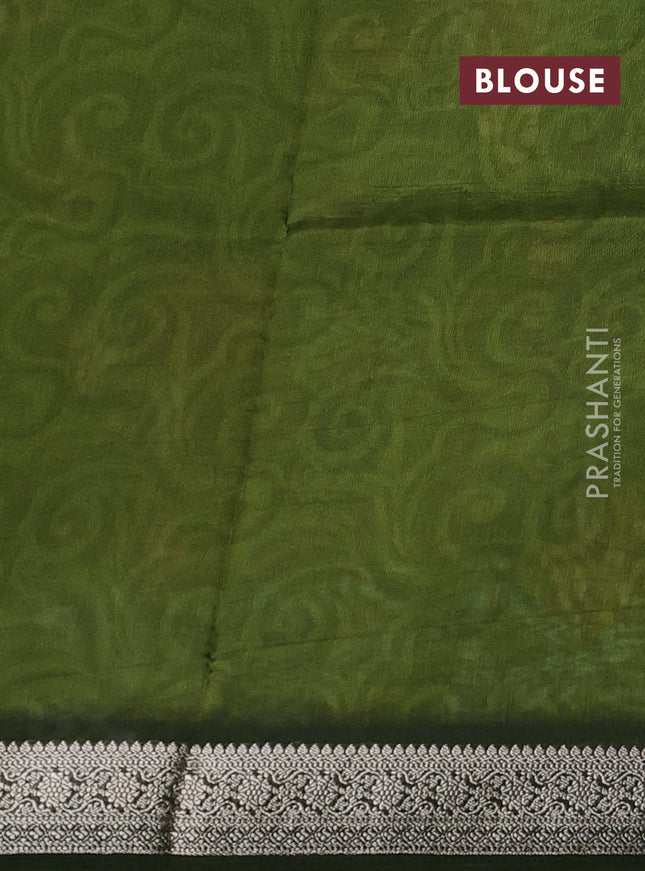 Tussar georgette silk saree mehendi green with allover digital prints and zari woven border
