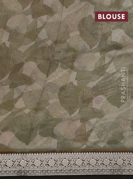 Tussar georgette silk saree sandal and brown with allover digital prints and zari woven border