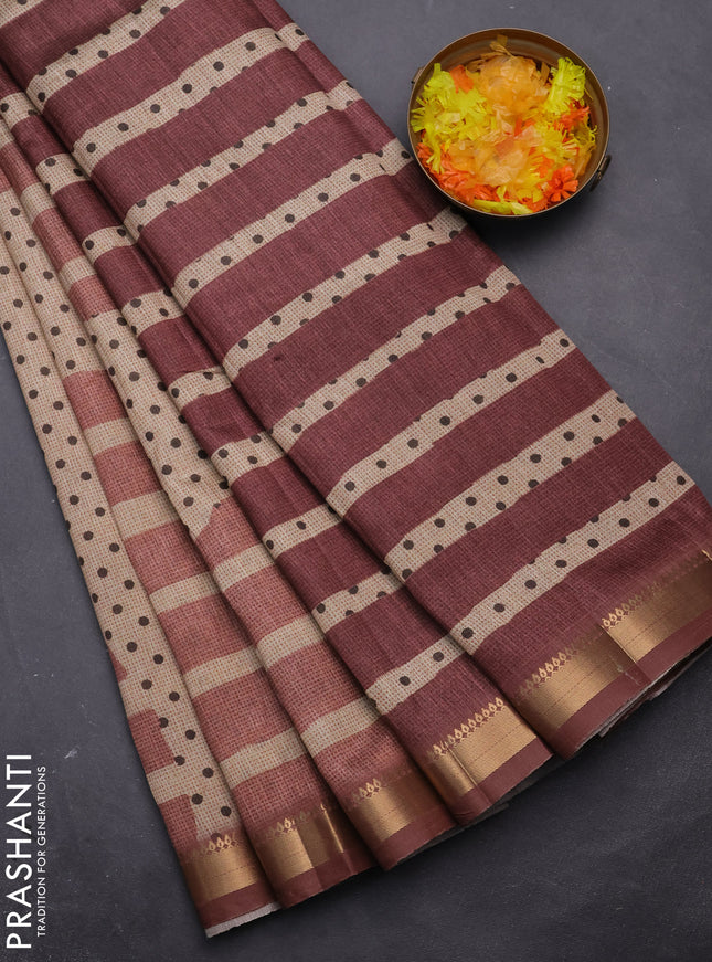 Semi tussar saree sandal and rust shade with allover prints and zari woven border