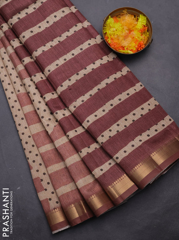 Semi tussar saree sandal and rust shade with allover prints and zari woven border