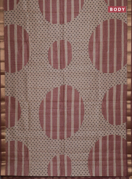 Semi tussar saree sandal and rust shade with allover prints and zari woven border