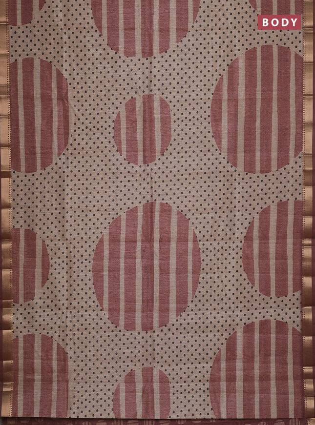 Semi tussar saree sandal and rust shade with allover prints and zari woven border