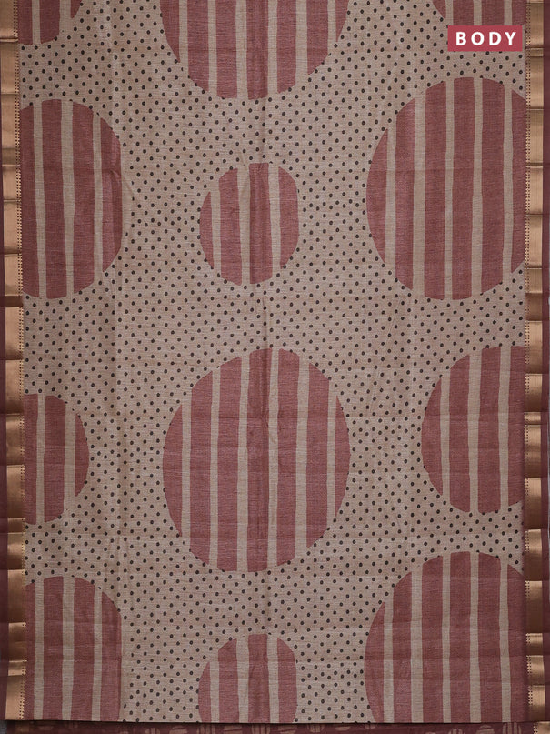 Semi tussar saree sandal and rust shade with allover prints and zari woven border
