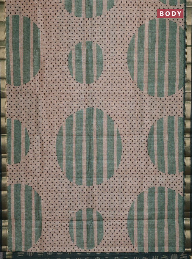 Semi tussar saree sandal and green with allover prints and zari woven border