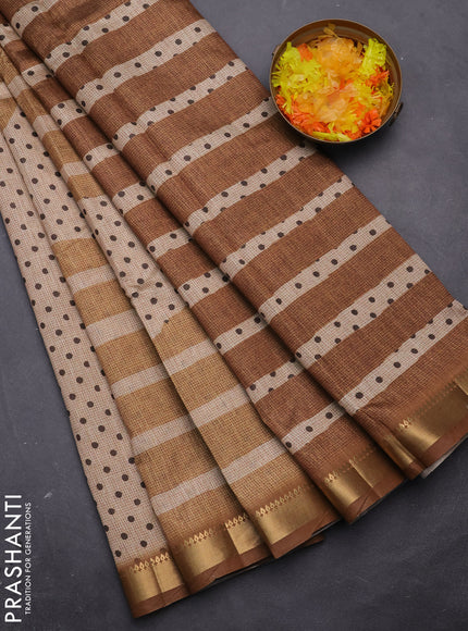 Semi tussar saree sandal and dark mustard with allover prints and zari woven border