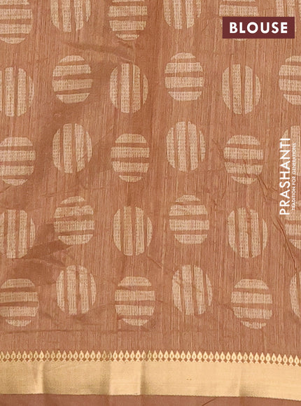 Semi tussar saree sandal and dark mustard with allover prints and zari woven border