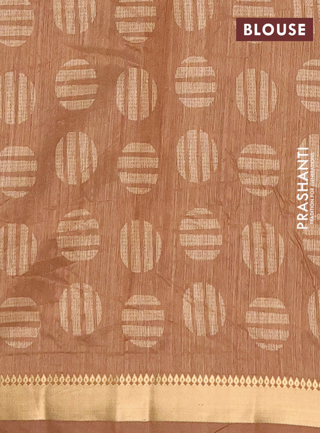 Semi tussar saree sandal and dark mustard with allover prints and zari woven border