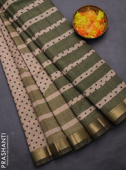 Semi tussar saree sandal and sap green with allover prints and zari woven border