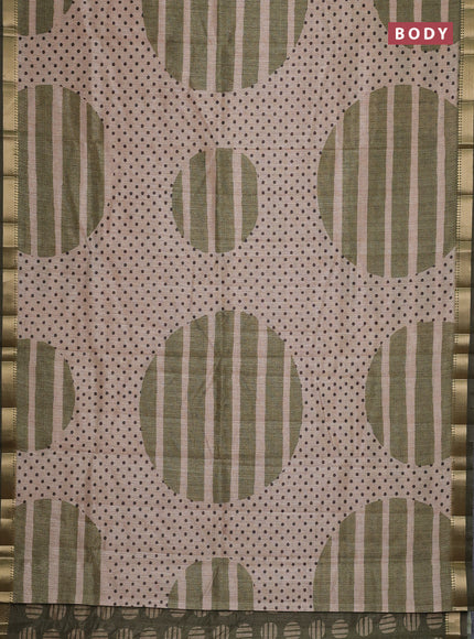 Semi tussar saree sandal and sap green with allover prints and zari woven border