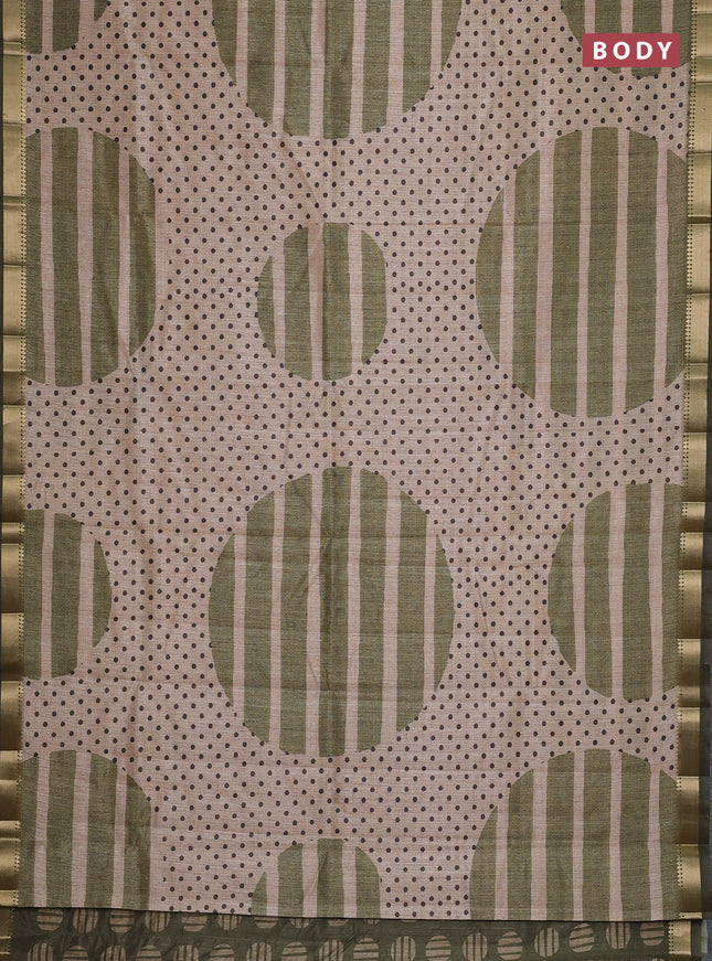 Semi tussar saree sandal and sap green with allover prints and zari woven border