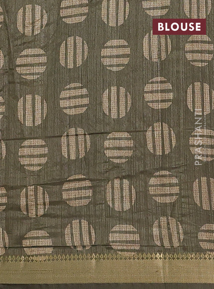 Semi tussar saree sandal and sap green with allover prints and zari woven border