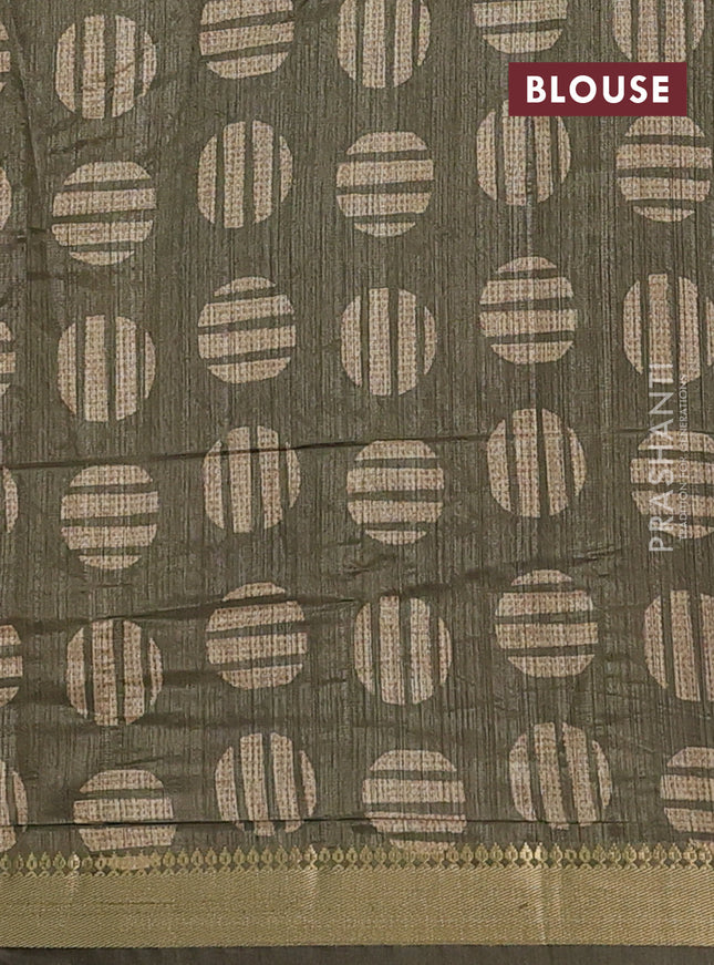 Semi tussar saree sandal and sap green with allover prints and zari woven border