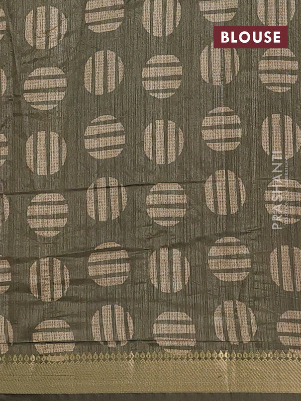 Semi tussar saree sandal and sap green with allover prints and zari woven border