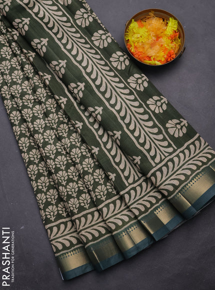 Semi tussar saree green and blue shade with floral butta prints and zari woven border