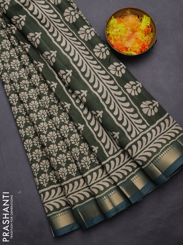 Semi tussar saree green and blue shade with floral butta prints and zari woven border