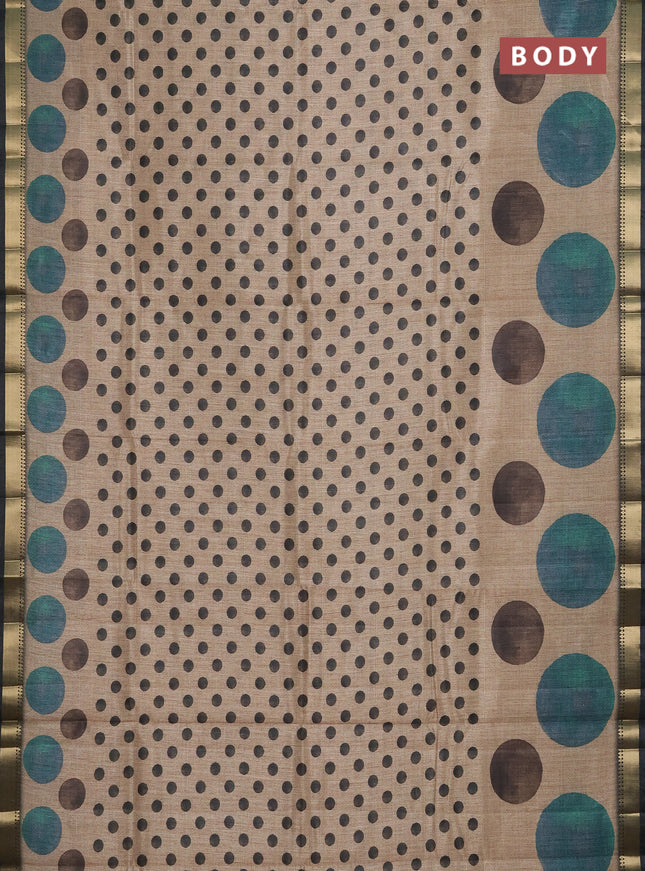 Semi tussar saree sandal and black with butta prints and zari woven border