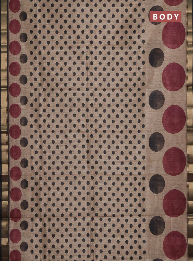 Semi tussar saree sandal and black with butta prints and zari woven border