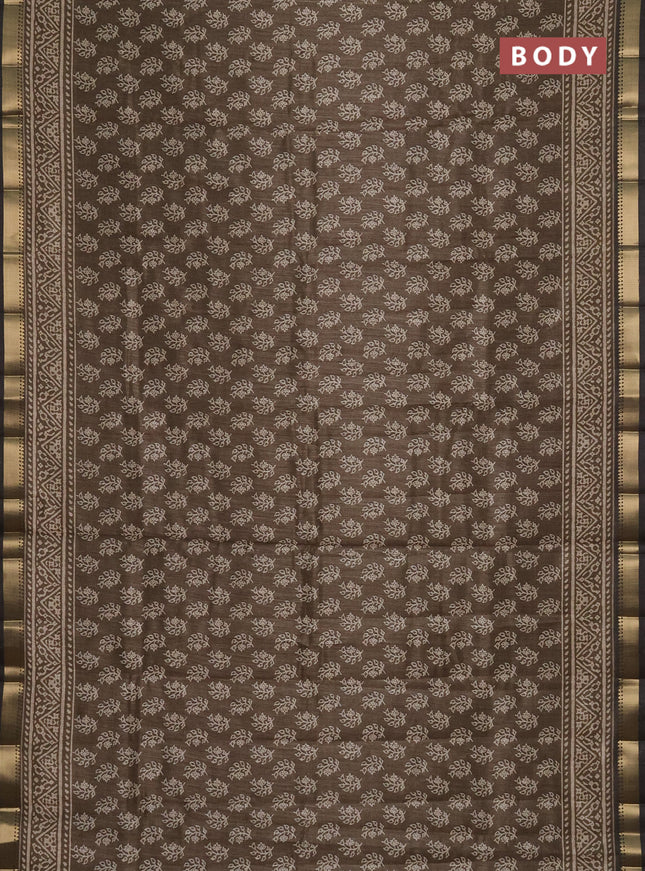 Semi tussar saree sap green with allover butta prints and zari woven border