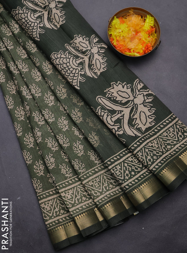 Semi tussar saree green with allover butta prints and zari woven border