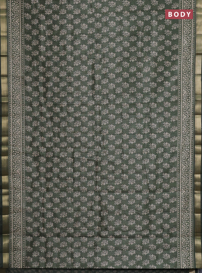 Semi tussar saree green with allover butta prints and zari woven border
