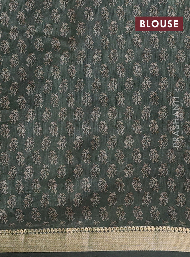 Semi tussar saree green with allover butta prints and zari woven border