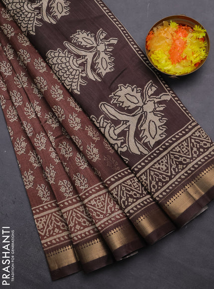 Semi tussar saree brown with allover butta prints and zari woven border