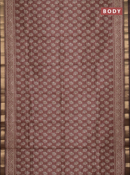 Semi tussar saree brown with allover butta prints and zari woven border