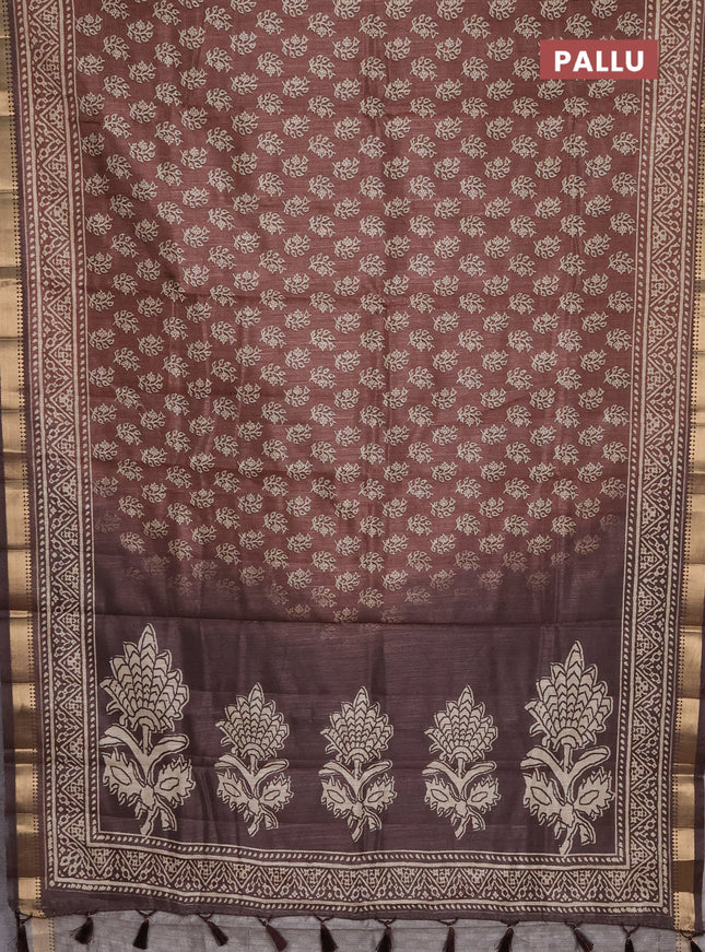Semi tussar saree brown with allover butta prints and zari woven border