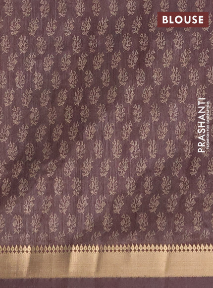 Semi tussar saree brown with allover butta prints and zari woven border