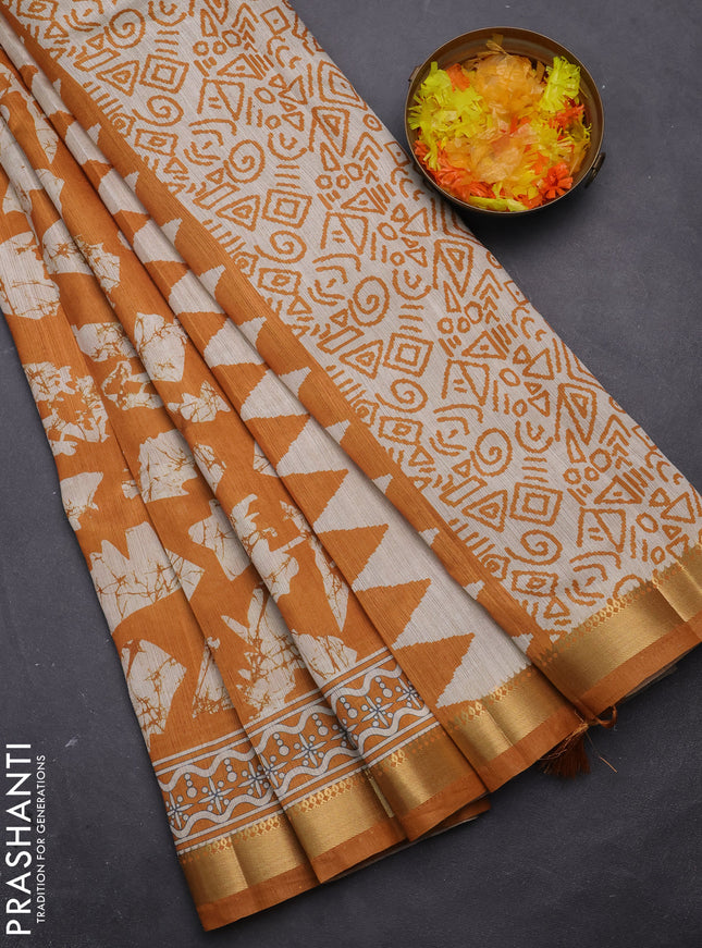 Semi tussar saree mustard yellow and beige with allover geometric prints and zari woven border