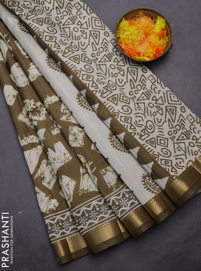 Semi tussar saree mehendi green and beige with allover geometric prints and zari woven border
