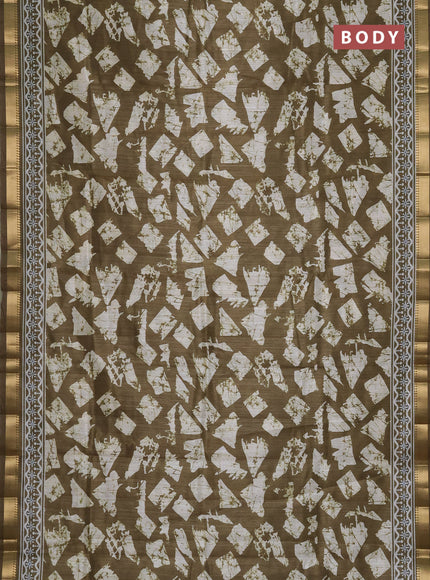 Semi tussar saree mehendi green and beige with allover geometric prints and zari woven border