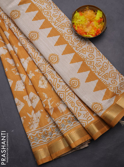 Semi tussar saree mustard yellow and beige with allover geometric prints and zari woven border