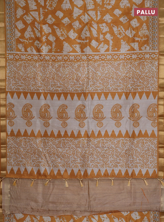 Semi tussar saree mustard yellow and beige with allover geometric prints and zari woven border
