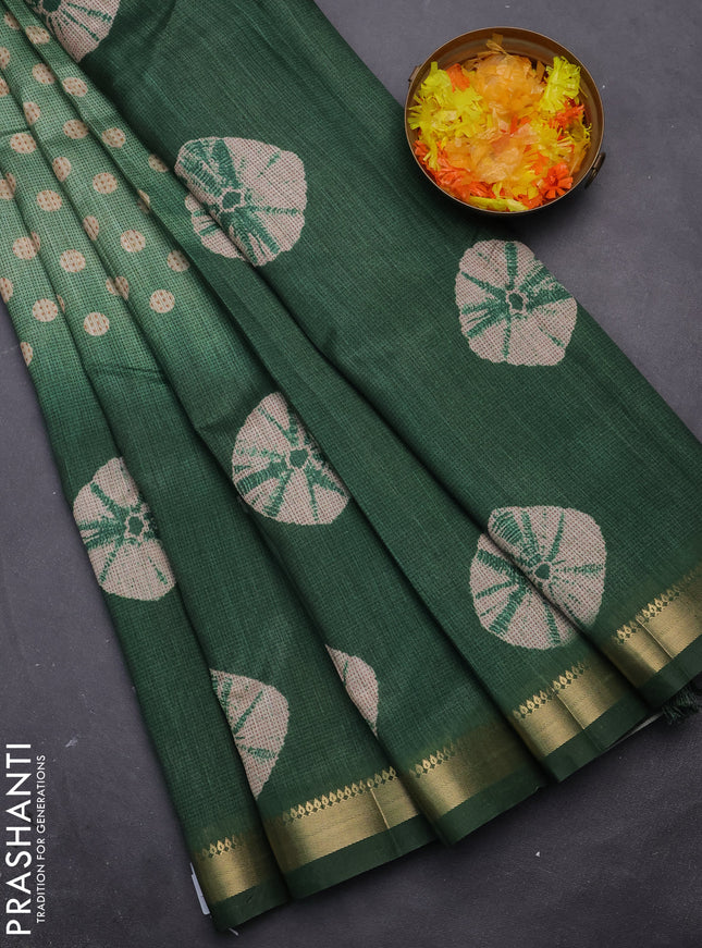 Semi tussar saree green shade with butta prints and zari woven border