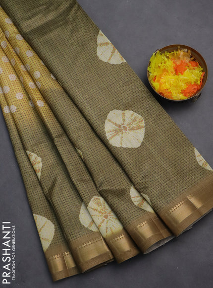 Semi tussar saree yellow and green shade with butta prints and zari woven border