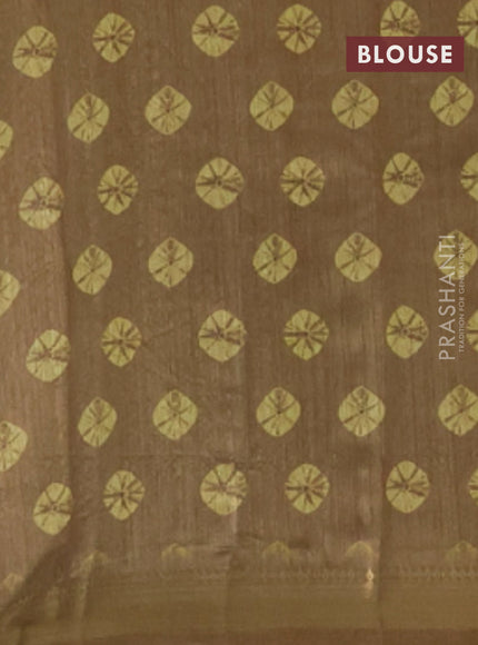 Semi tussar saree yellow and green shade with butta prints and zari woven border