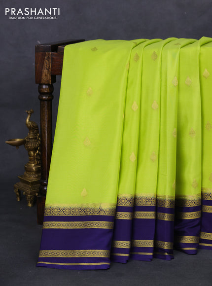 Pure mysore silk saree fluorescent green and navy blue with zari woven buttas and zari woven border