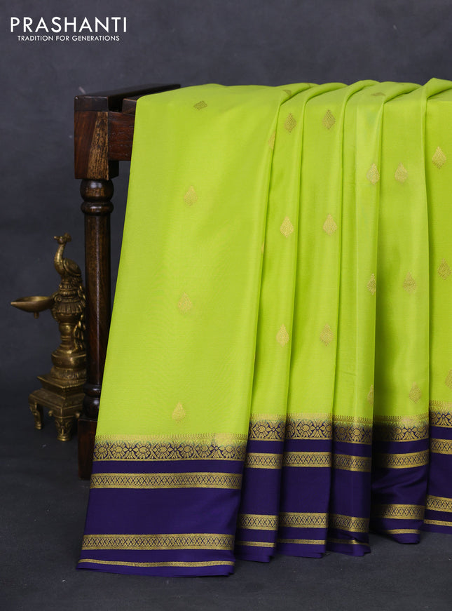Pure mysore silk saree fluorescent green and navy blue with zari woven buttas and zari woven border