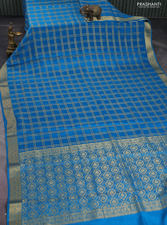 Pure mysore silk saree cs blue with allover zari checked pattern and zari woven border
