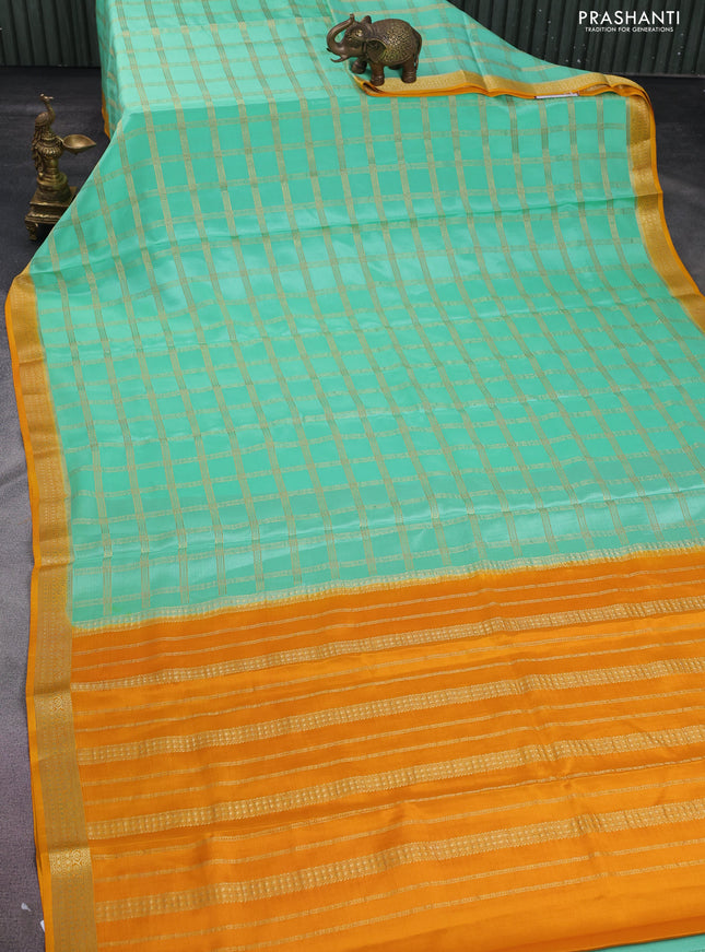 Pure mysore silk saree teal green and mustard yellow with allover zari checked pattern and zari woven border